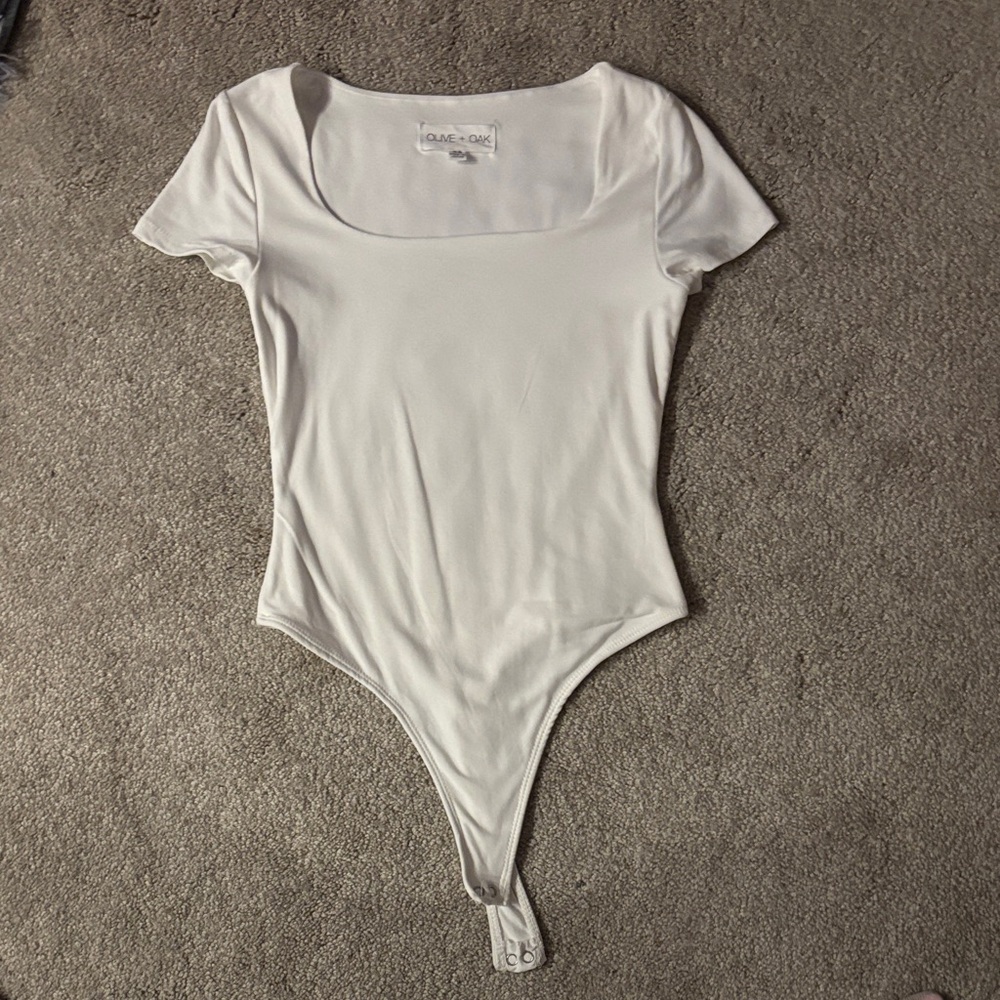 Women’s Short Sleeve White Bodysuit (never worn)